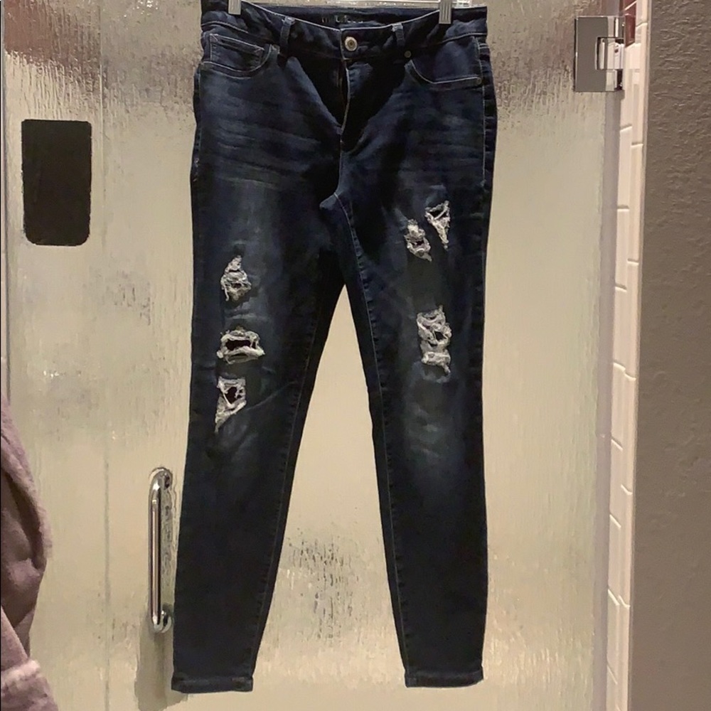 Maurice’s distressed blue jeans.